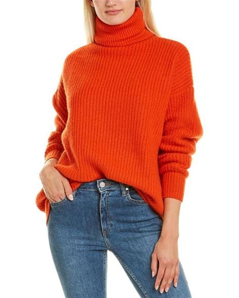 orange oversized turtleneck sweater